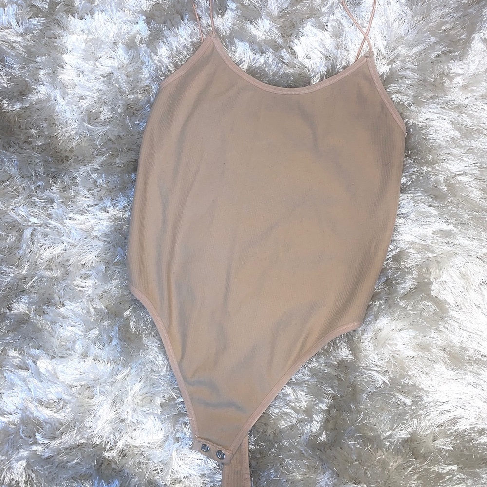 Tan body suit